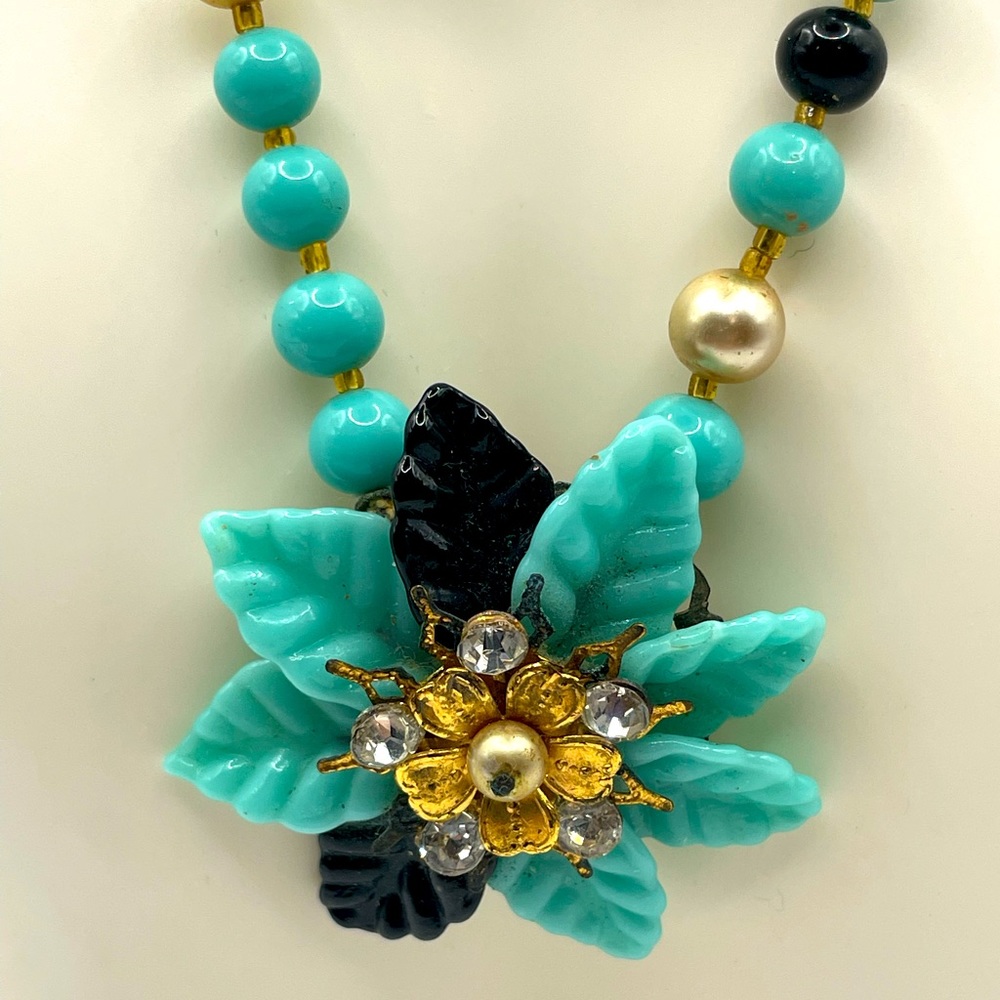 VNTG BLUE GLASS FLOWER AND BEADS. 13”